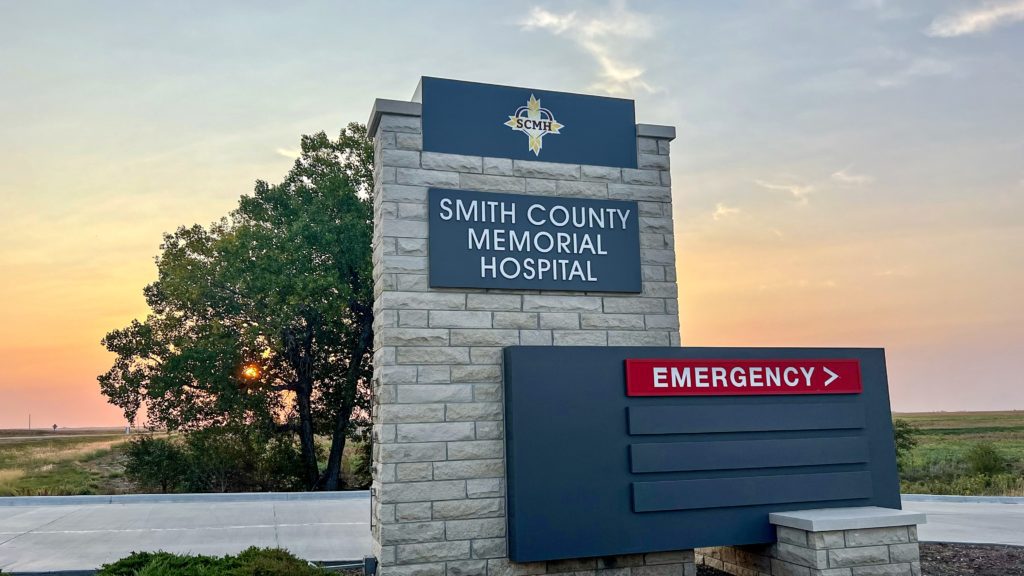 Sunrise over the Smith County Memorial Hospital sign.