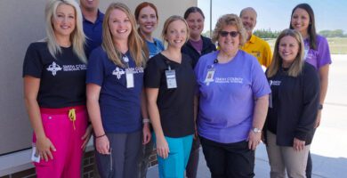 Sarah Ragsdale poses with the Rehab Services team.